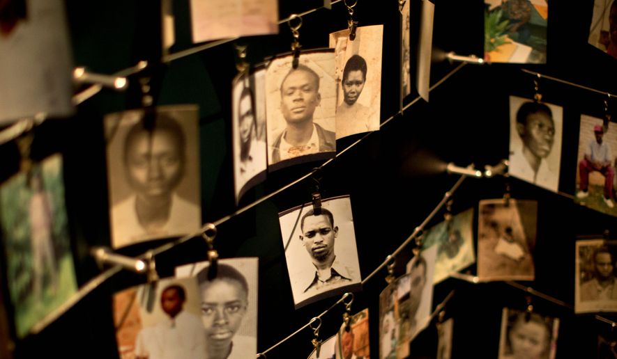 Photographs of some of those who died in the 1994 genocide against Tutsi hang in a display in the Kigali Genocide Memorial Centre.