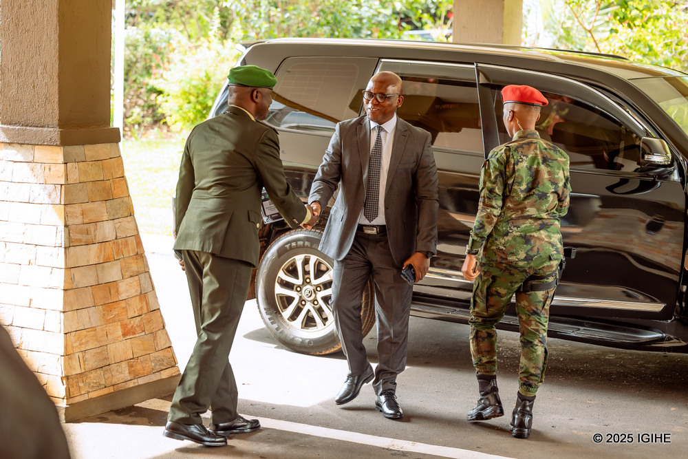 Defence Minister Juvenal Marizamunda arrives for the conference.