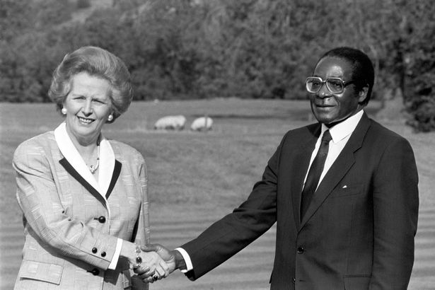 Prime Minister Margaret Thatcher shakes hands with Mugabe in October 1988
