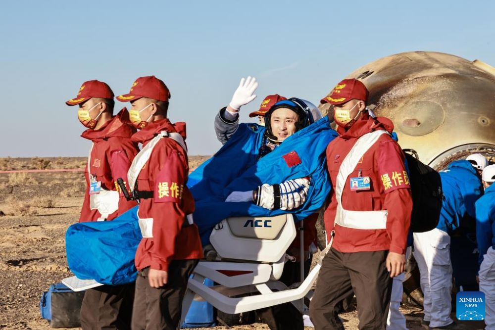 Astronaut Zhu Yangzhu is out of the return capsule of the Shenzhou-16 manned spaceship at the Dongfeng landing site in north China's Inner Mongolia Autonomous Region Oct. 31, 2023. The return capsule of the Shenzhou-16 manned spaceship, carrying astronauts Jing Haipeng, Zhu Yangzhu and Gui Haichao, touched down at the Dongfeng landing site in north China's Inner Mongolia Autonomous Region on Tuesday. (Xinhua/Li Gang)