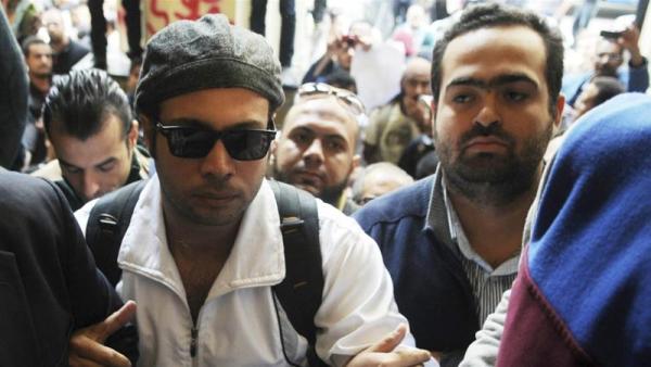 Ahmed Maher (L) is an activist and co-founder of the April 6 youth movement that was pivotal in the 2011 Egyptian revolution