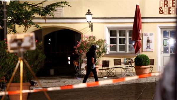 The blast went off at a bar outside a music festival in Ansbach, Germany