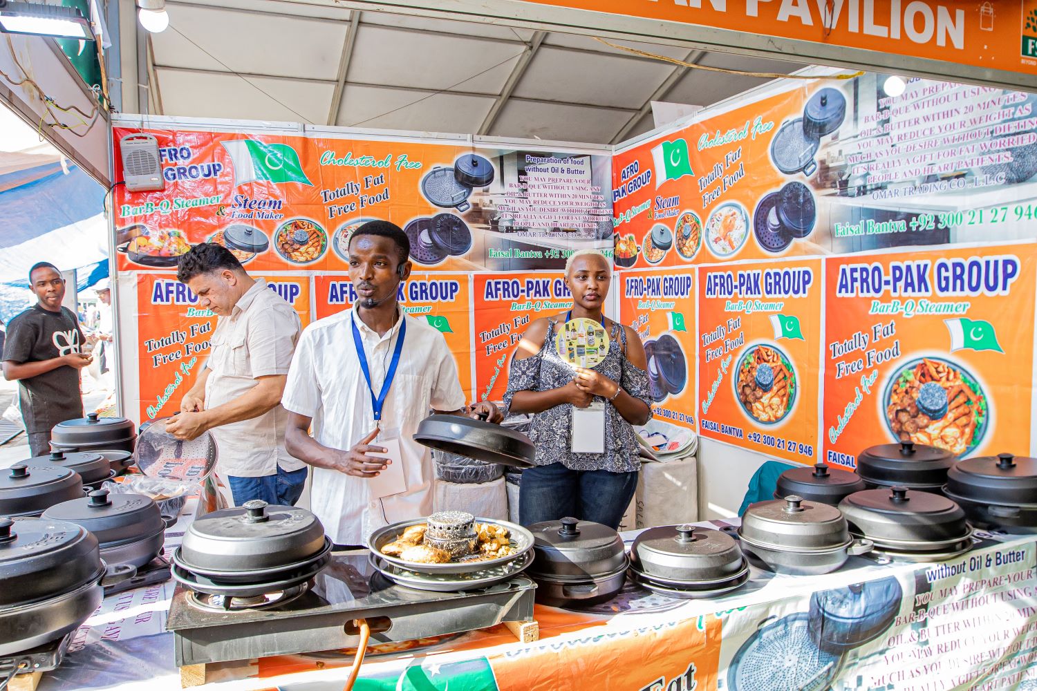 Muhammad Saleem and his two employees busy in their stall.