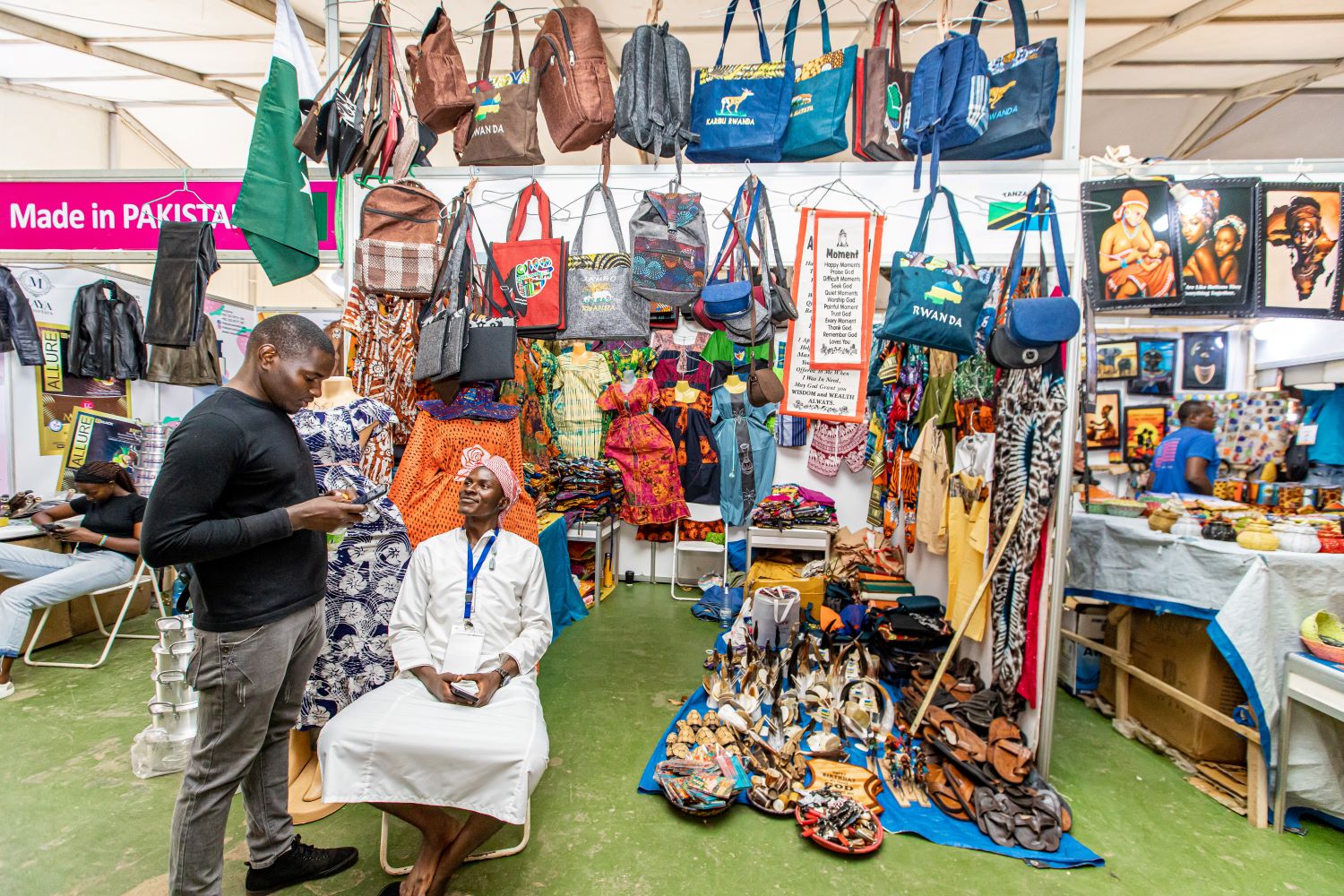 Twenty-four-year-old Mugisha Djuma is among the hundreds of youths helping various traders showcase and sell their products at the Rwanda Expo 2024 in Gikondo.