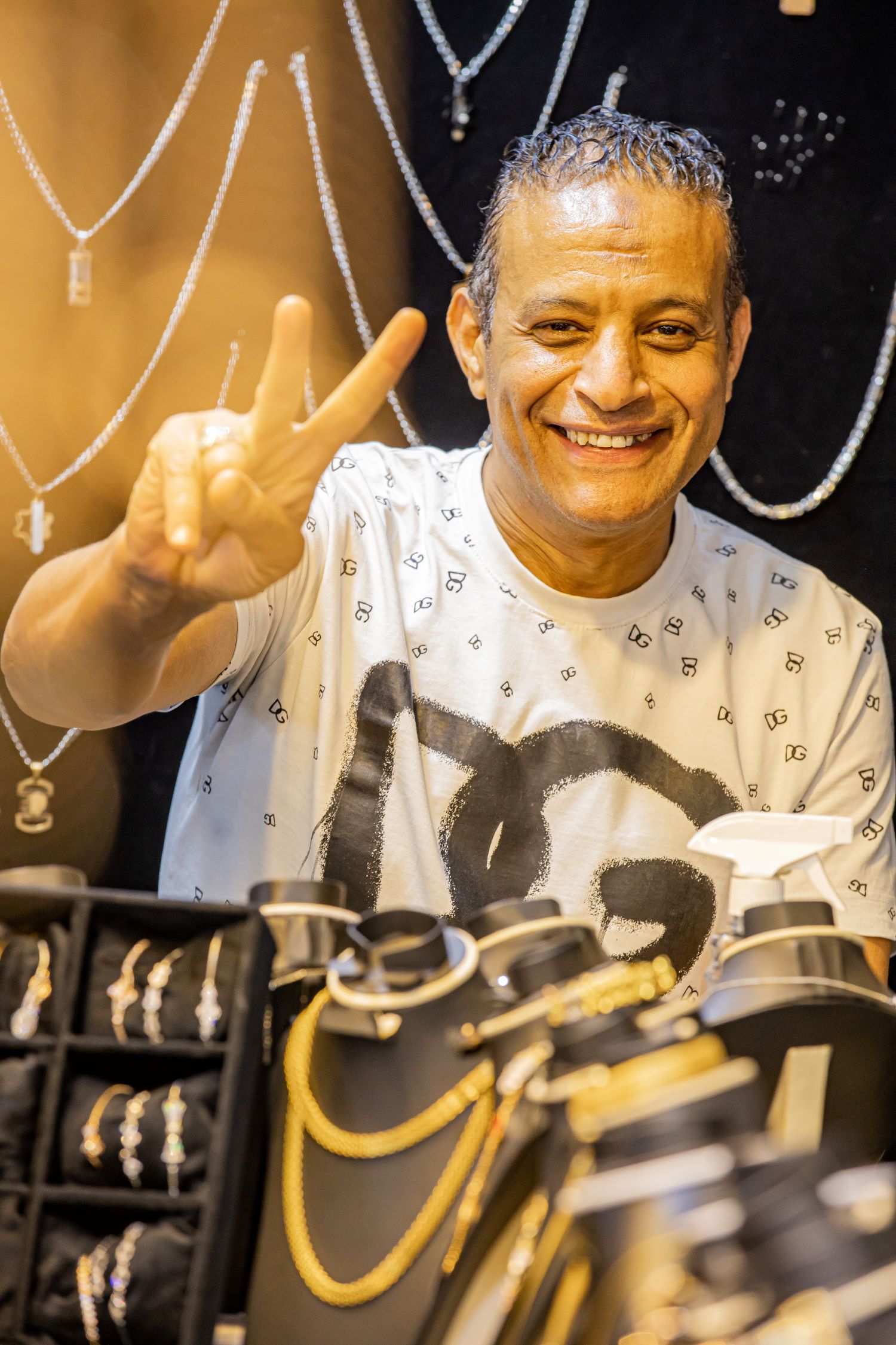 Egyptian national Adel Kamel sells gold-plated jewellery.