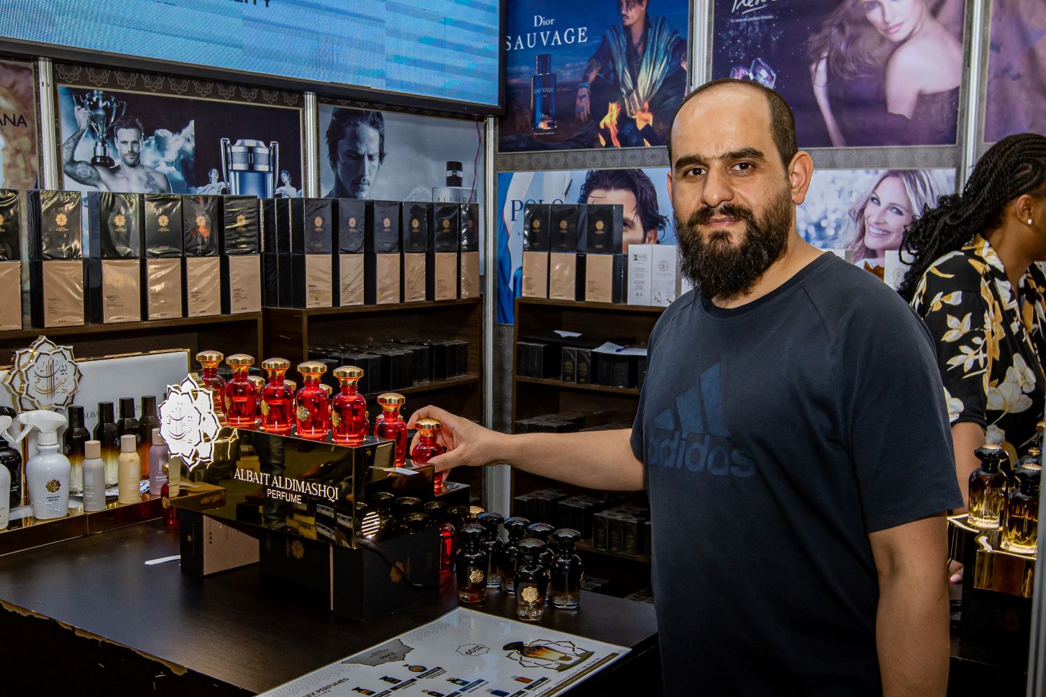 An Egyptian businessman in his stall where he sells perfume imported from Dubai.
