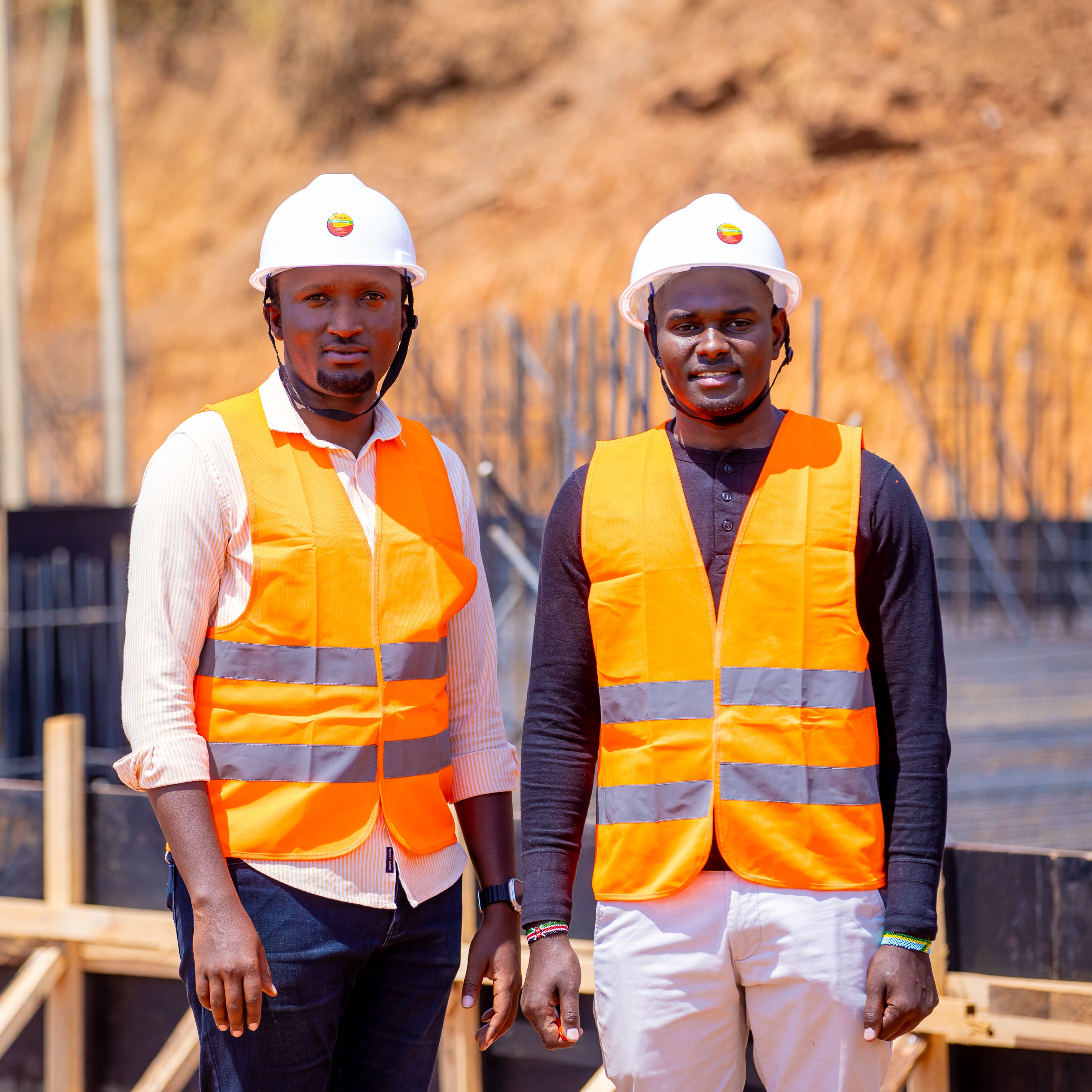 Boris Muhirwa (l) is a project manager for DND Developers in Kigali.