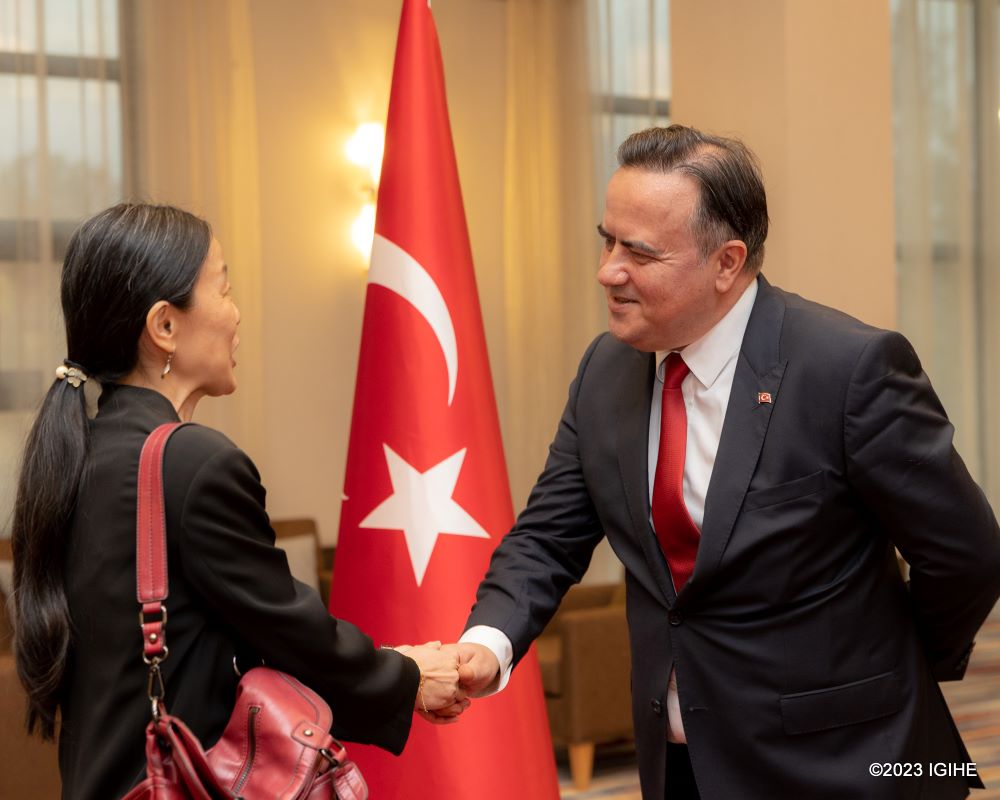Ambassador Yüksel welcoming guests at the celebration. 