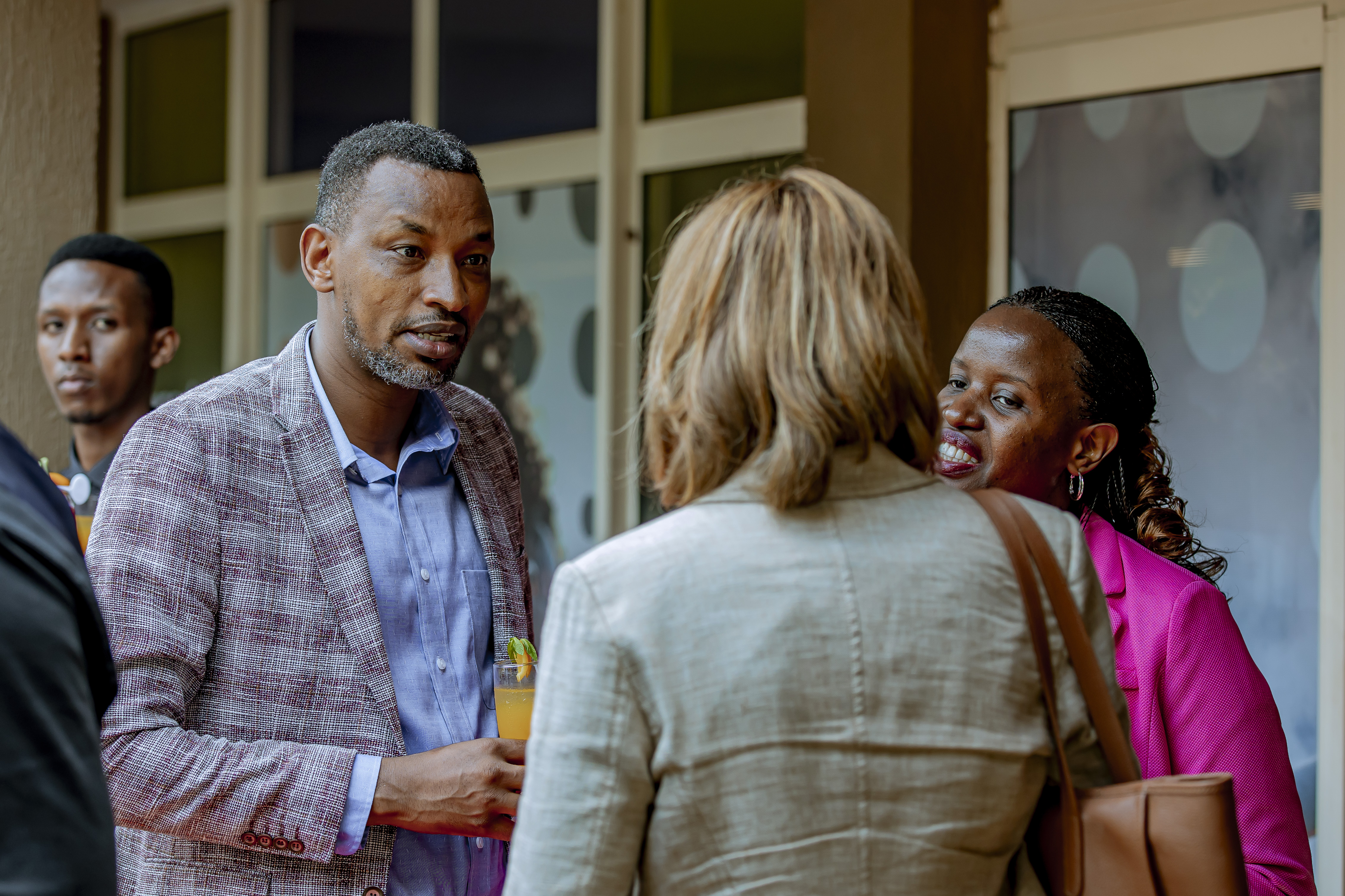 Charles Habonimana, the Managing Director of Rwanda Airports Company (RAC) converses with Brussels Airlines Chief Executive Officer (CEO) Dorothea Von Boxberg during the event.