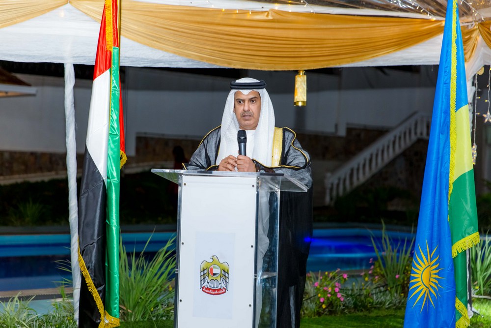 Ambassador Al-Qahtani holding a speech for his guests