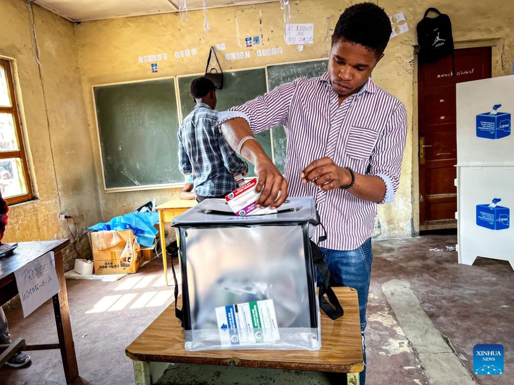 A voter casts his vote at a polling station in Goma, Democratic Republic of the Congo (DRC), Dec. 20, 2023. Voters went to the polls Wednesday in the DRC, Africa's second-largest country by land area, amid a tense security context. According to the official electoral calendar, provisional results are expected on Dec. 31, and the president-elect will be sworn in on Jan. 20 next year. (Str/Xinhua)