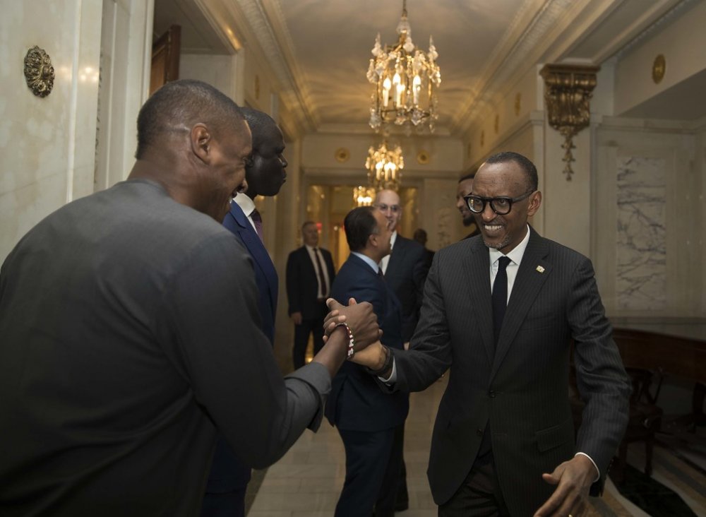 The president Kagame greeting Toronto Rapters President, Masai Ujiri