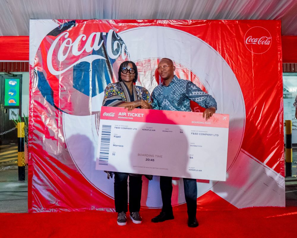 BRALIRWA Plc Managing Director, Ms. Ethel Emma-Uche awarding one of the top six outstanding distributors with an exclusive, all-expenses-paid trip to watch AFCON 2025.