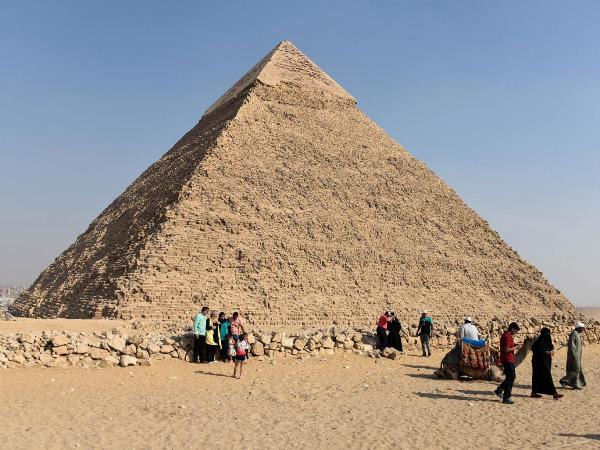 Tourists visit the Giza pyramids, on the southern outskirts of the Egyptian capital, Cairo AFP/Getty