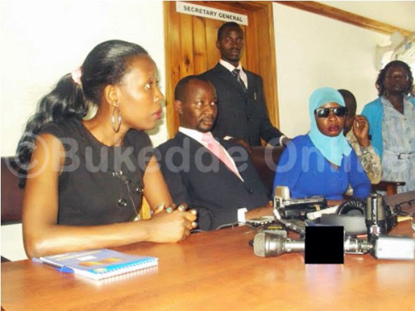 Forum for Democratic Change (FDC) spokesperson Ibrahim Semujju Nganda and Fatuma Naigaga (right)