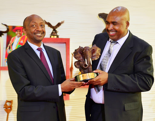 Prof. Simon Gicharu, founder and chairman MKU with Dr. Richard Masozera the Rwandan High Commissioner to Rwanda