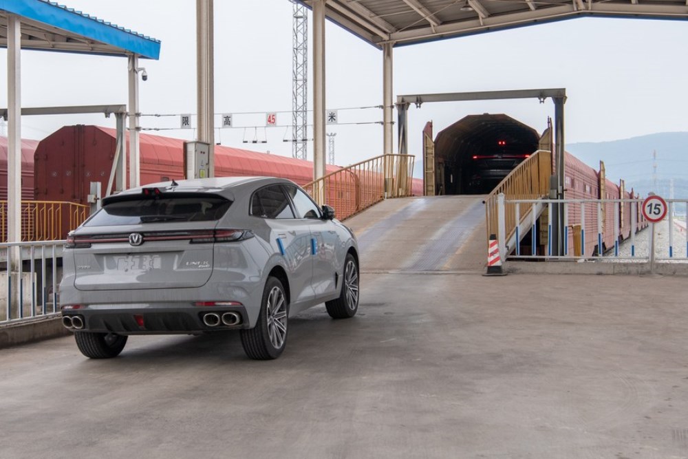 Cars produced by Changan Automobile are loaded onto a JSQ freight vehicle of China Railway Special Cargo Logistics Co., Ltd. at Yuzui Station in southwest China's Chongqing, July 21, 2022.
