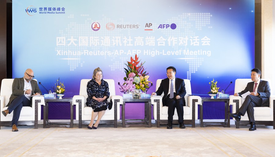 President of Xinhua News Agency Fu Hua, Reuters Head of Agency Sue Brooks, Vice President of the Associated Press (AP) YK Chan, and Michael Mainville, member of the Agence France-Presse (AFP) Executive Committee and AFP Asia-Pacific regional director, meet in Beijing to discuss cooperation to tackle pressing challenges facing media in times of change, Dec. 1, 2023.(Xinhua/Huang Jingwen)