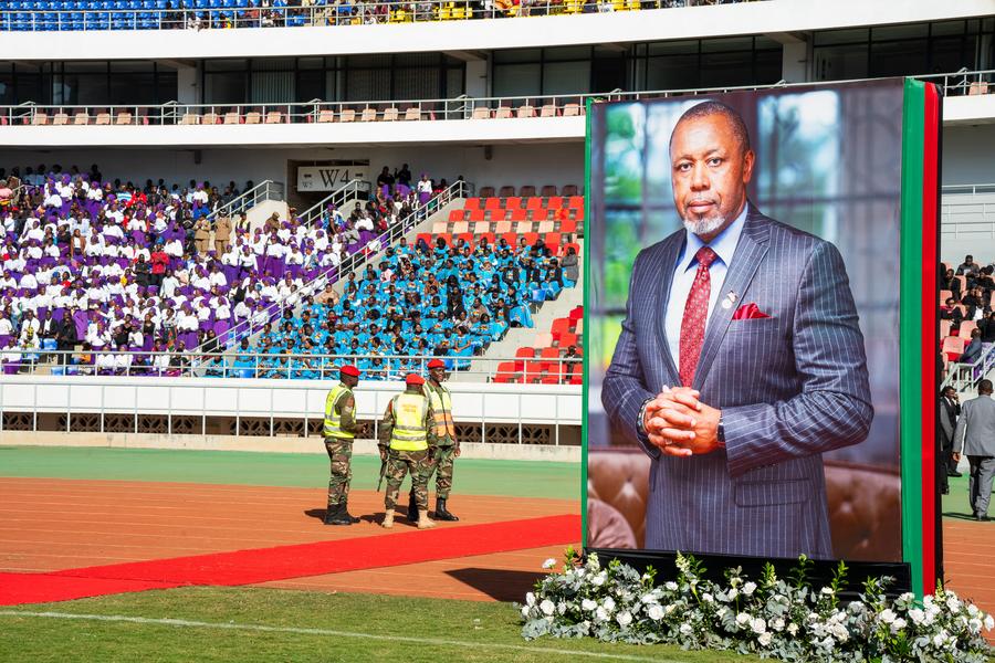 A portrait of the late Malawian Vice President Saulos Chilima is displayed during his funeral in Lilongwe, Malawi, June 16, 2024.