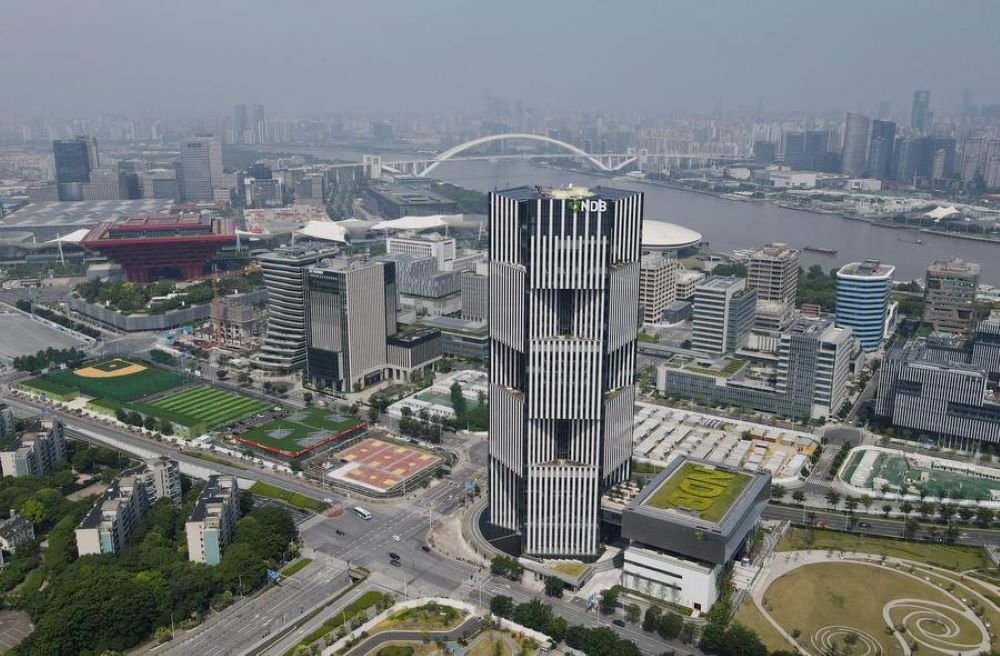 Aerial photo taken on June 17, 2022 shows the headquarters building of the New Development Bank (NDB), also known as the BRICS bank, in east China's Shanghai. (Xinhua/Fang Zhe)