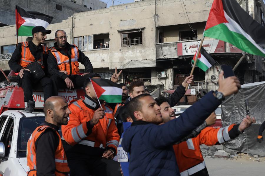 Palestinians celebrate the ceasefire deal with Israel in Gaza City, on Jan 19, 2025. (Photo by Mahmoud Zaki/Xinhua)