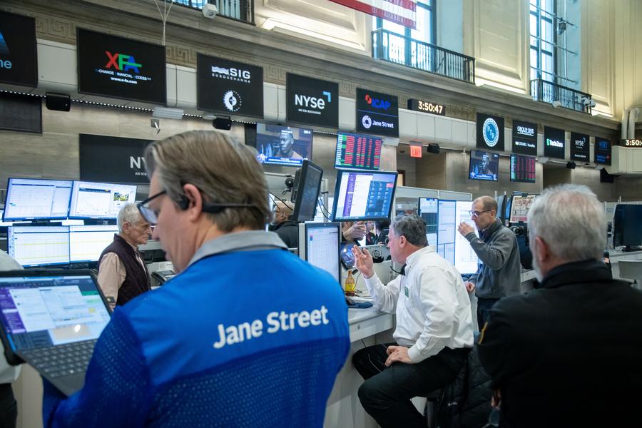 Traders work on the floor of the New York Stock Exchange in New York, the United States, on April 8, 2025.
