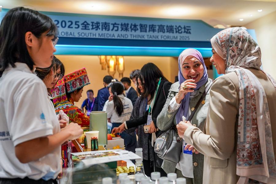 Delegates sample specialties at the opening ceremony of the 2025 Global South Media and Think Tank Forum in Kunming, Yunnan Province, southwest China, on September 6, 2025.