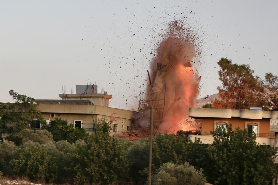 Photo taken on Sept. 18, 2025, shows an Israeli airstrike hitting a house in the center of Kfar Tebnit, near Nabatieh in southern Lebanon.