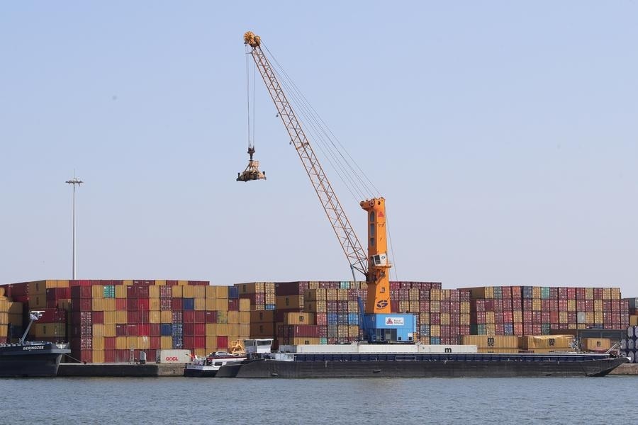 Ships and facilities are seen at the Port of Antwerp-Bruges in Antwerp, Belgium, April 28, 2022. The ports of Antwerp and Zeebrugge have merged into Europe's largest port, allowing for exports of 147 million tons per year.