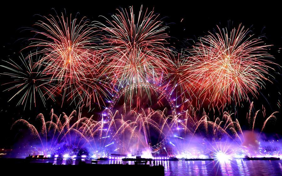 Fireworks explode in front of the London Eye in celebration of the New Year in London, Britain, January 1, 2026.