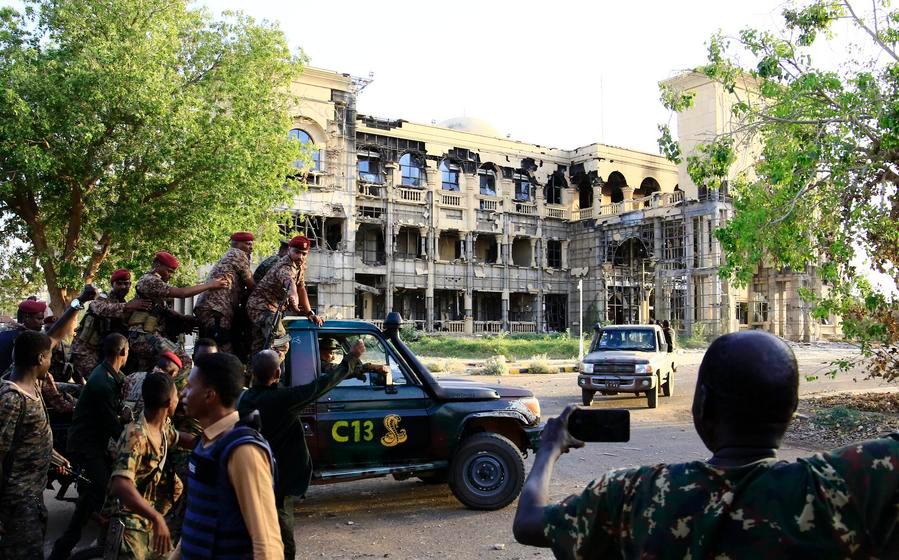 Abdel Fattah Al-Burhan (in the vehicle), chairman of Sudan's Transitional Sovereign Council and commander of the Sudanese Armed Forces (SAF), departs from the Presidential Palace in Khartoum, Sudan, on March 26, 2025. Al-Burhan declared from inside the Presidential Palace in Khartoum on March 24, 2025 that "Khartoum is free," referring to the end of the Rapid Support Forces' control over the capital, according to Sudan TV.