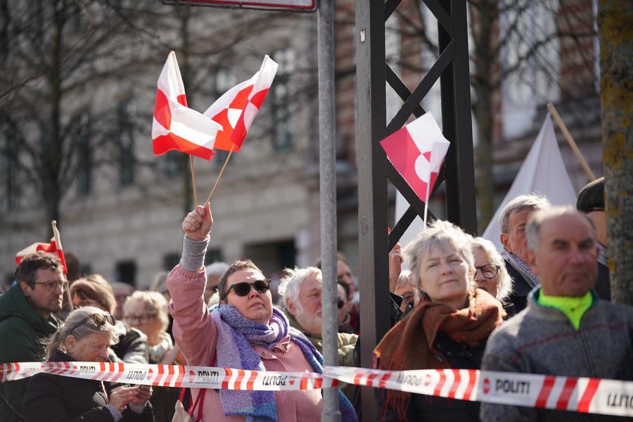 People march to protest in front of the U.S. Embassy in Copenhagen, capital of Denmark, on March 29, 2025.