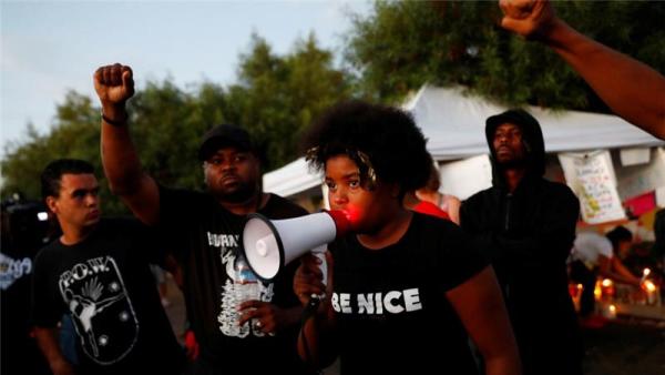 Protesters have called for justice over the police killing of Alfred Olango