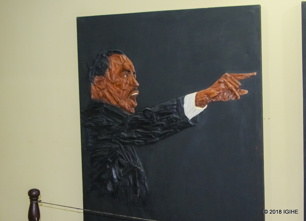 A painting of Martin Luther King Jr. is next to the one of Former President Barack Obama