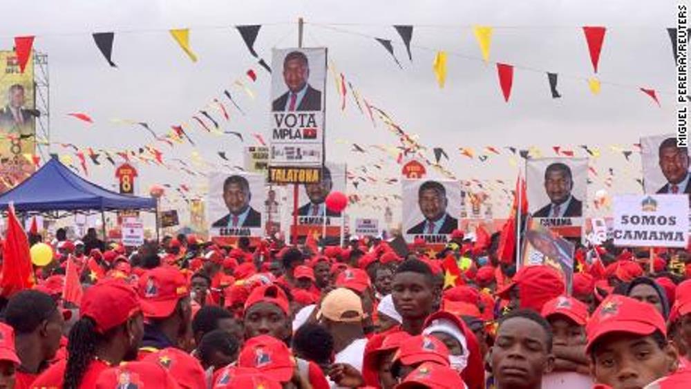 Supporters of Angola's President and leader of the ruling MPLA Joao Lourenco attend their party's final rally in Camama, on the outskirts of the capital Luanda, in Angola, on August 20, 2022. Photo CNN 