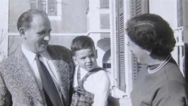'No one wanted me to know the truth,' said Gil Grunbaum, pictured in the late 1950s with his adoptive parents