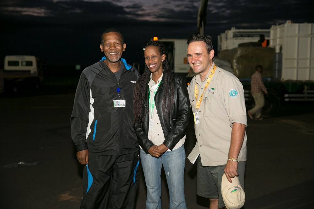 South Africa's ambassador to Rwanda, George Nkosinati Twala with RDB Chief Tourism Officer, Belyse Kaliza and the employee of African Park which manages Akagera on the arrival of black Rhinos.