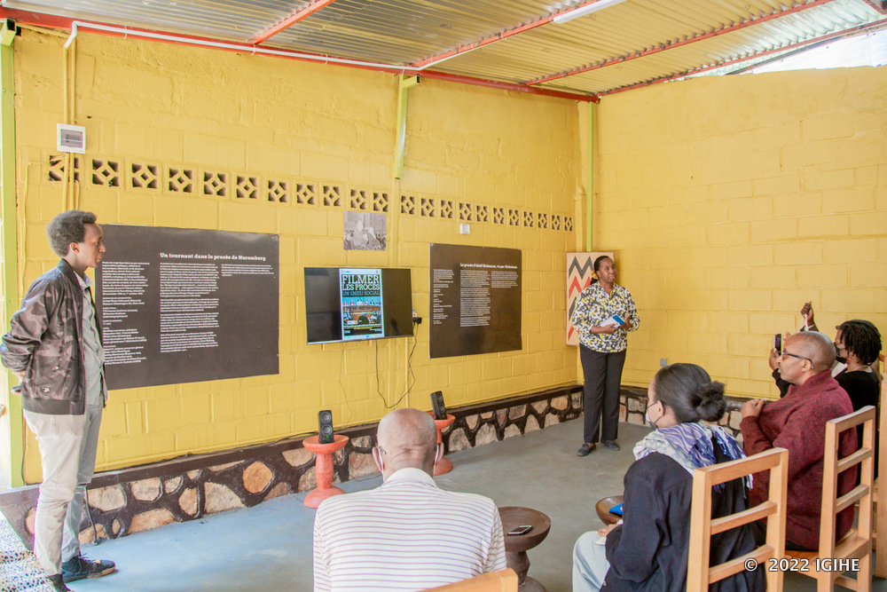 Assumpta Mugiraneza taking guests through archives kept at Iriba center. 