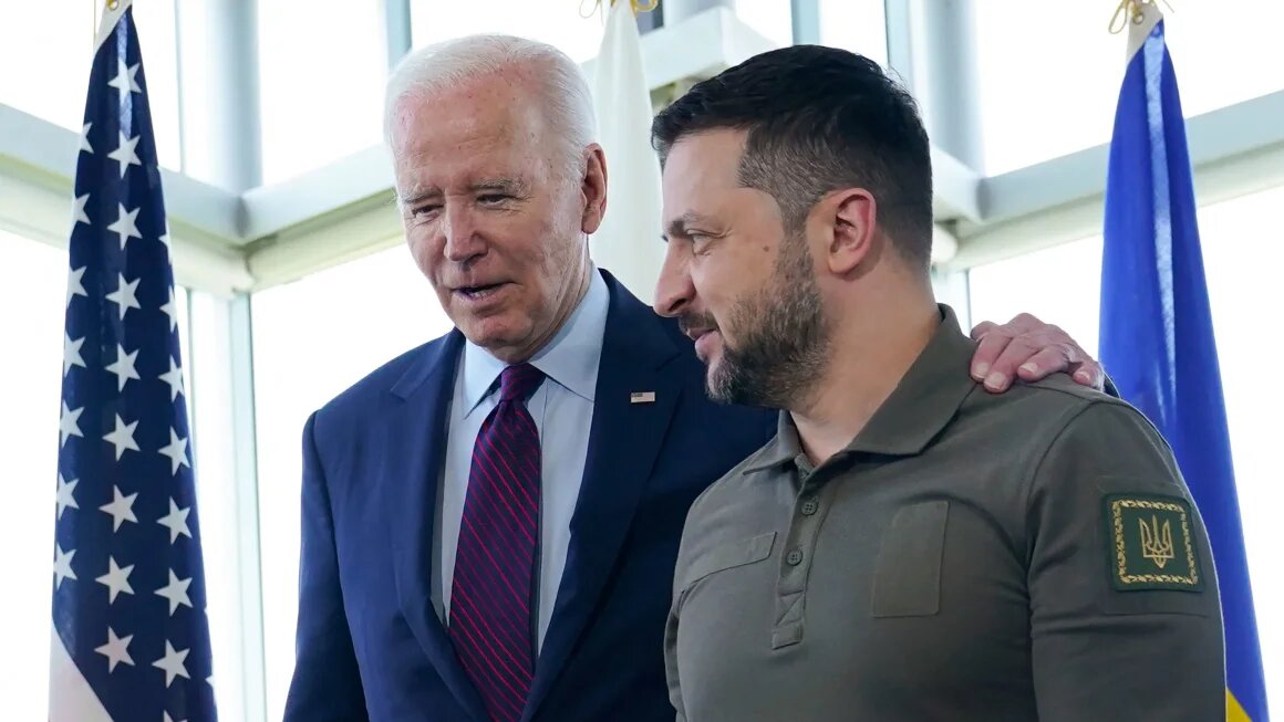 United States President Joe Biden walks alongside his Ukrainian counterpart, Volodymyr Zelensky, ahead of a working session on Ukraine during the G7 Leaders' Summit in Hiroshima on May 21, 2023.
