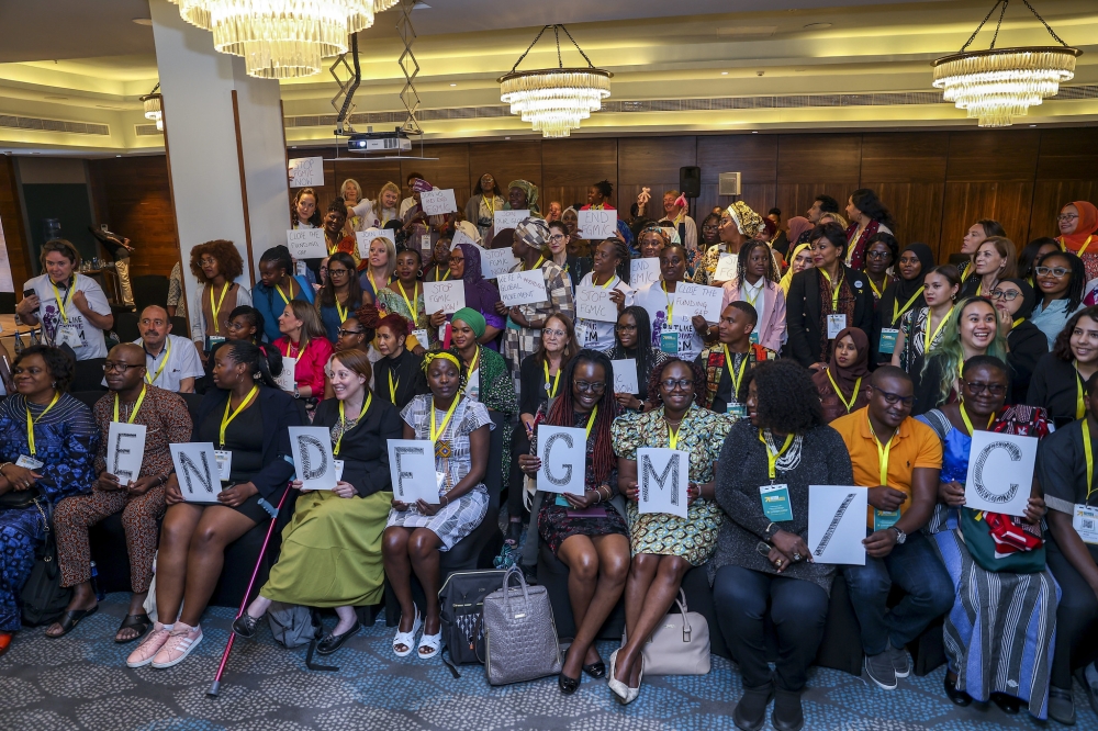 Delegates posing for a photo at a pre-conference focused on ending FMG on Sunday 16th July 2023. Photo by The New Times  