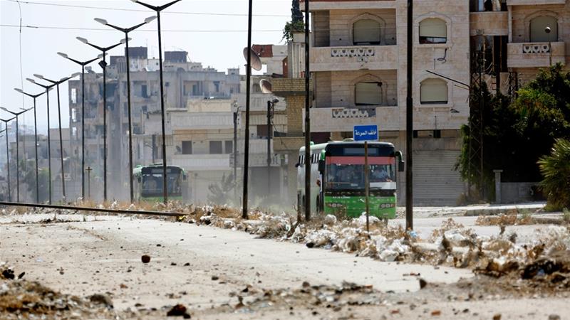 Syrian government buses evacuated residents from Al-Waer in September, 2016