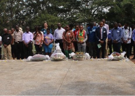 Commonwealth youth laying wreaths at  Kigali genocide memorial