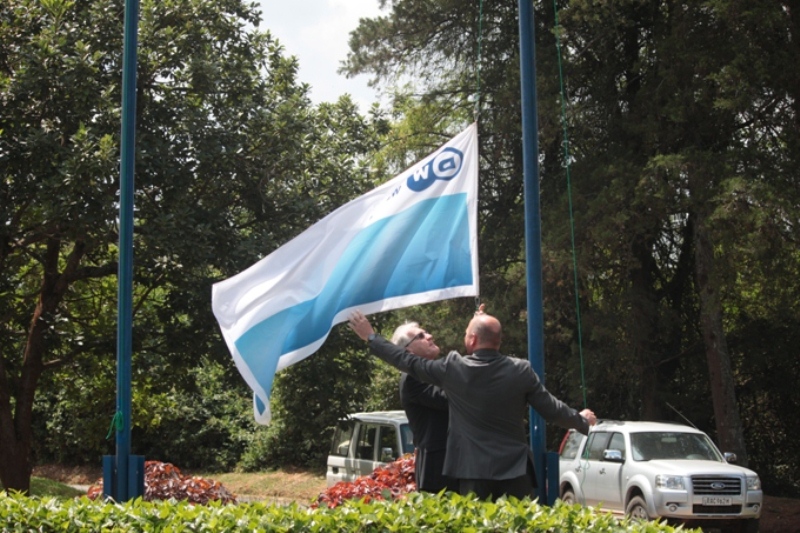 German officials pulling down the flag on the land where Deutche Welle operated last year. 