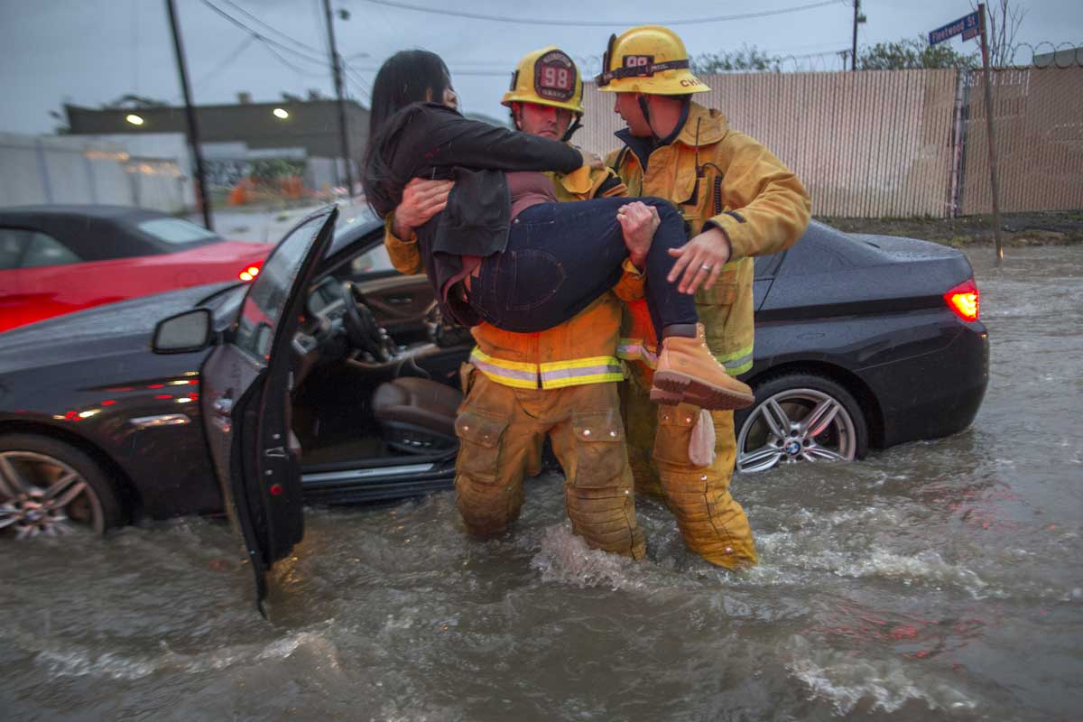 Firefighters rescued dozens from their cars stuck in the water.