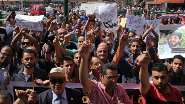 Journalists protest outside the Egyptian press syndicate in downtown Cairo