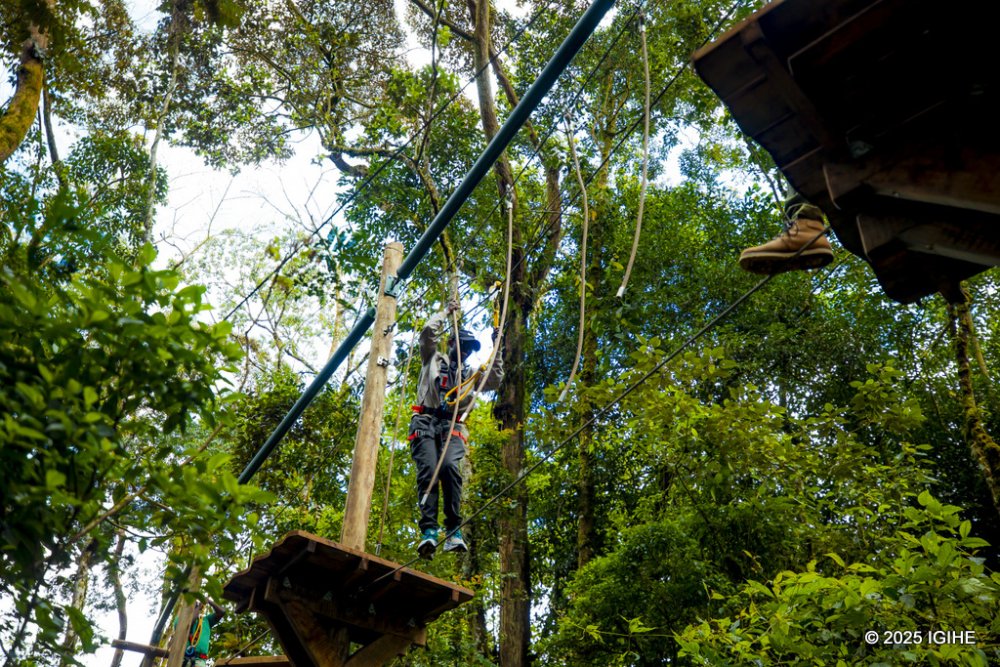The wooden These planks are not fixed in one place; crossing them requires careful balance while holding onto the rope.     