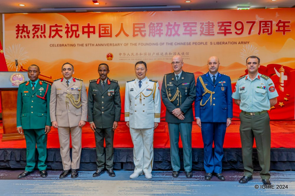 Defence attachés to Rwanda who attended the event in a group photo with Senior Captain (Navy) Li. 