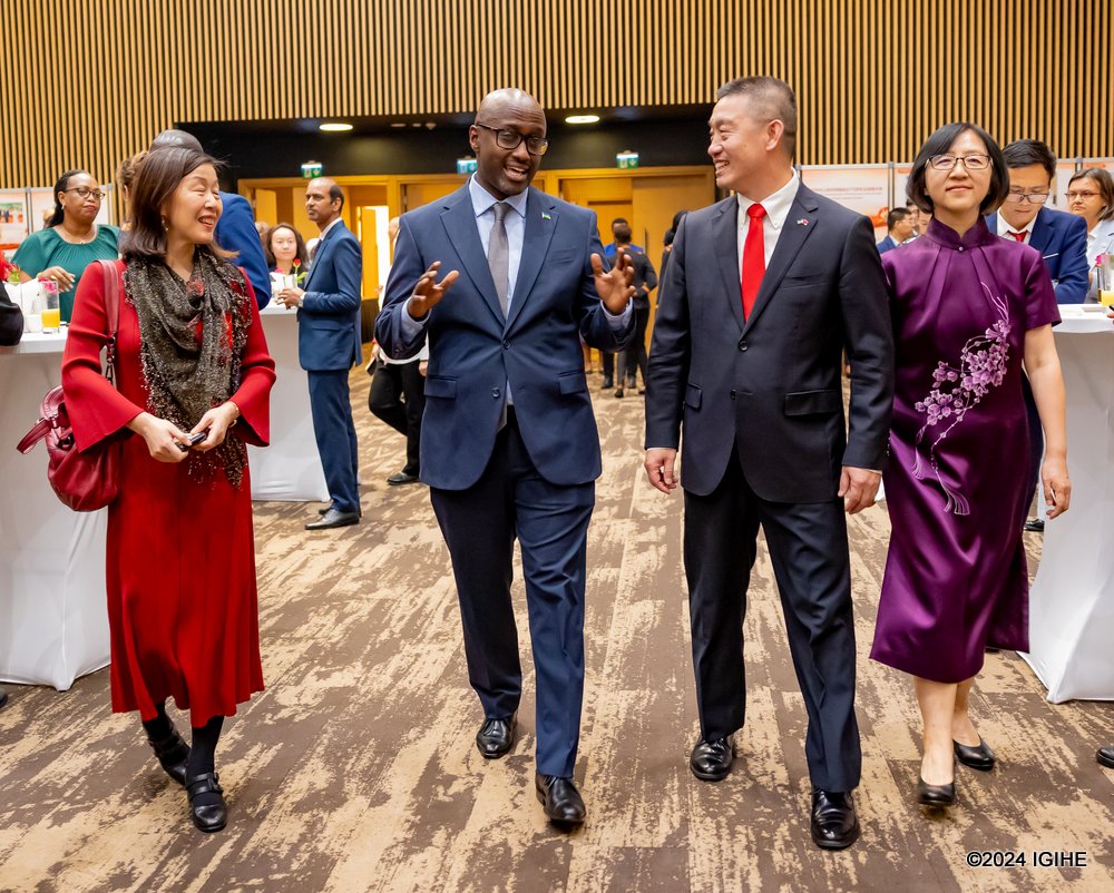 Chnese Ambassador to Rwanda, Wang Xuekun welcoming the Minister of Foreign Affairs and International Cooperation, Olivier Nduhungirehe.