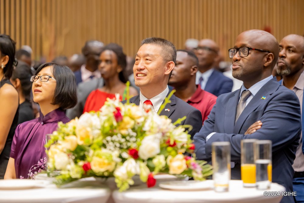 Amb. Wang Xuekun and Minister Nduhungirehe following performances at the event.