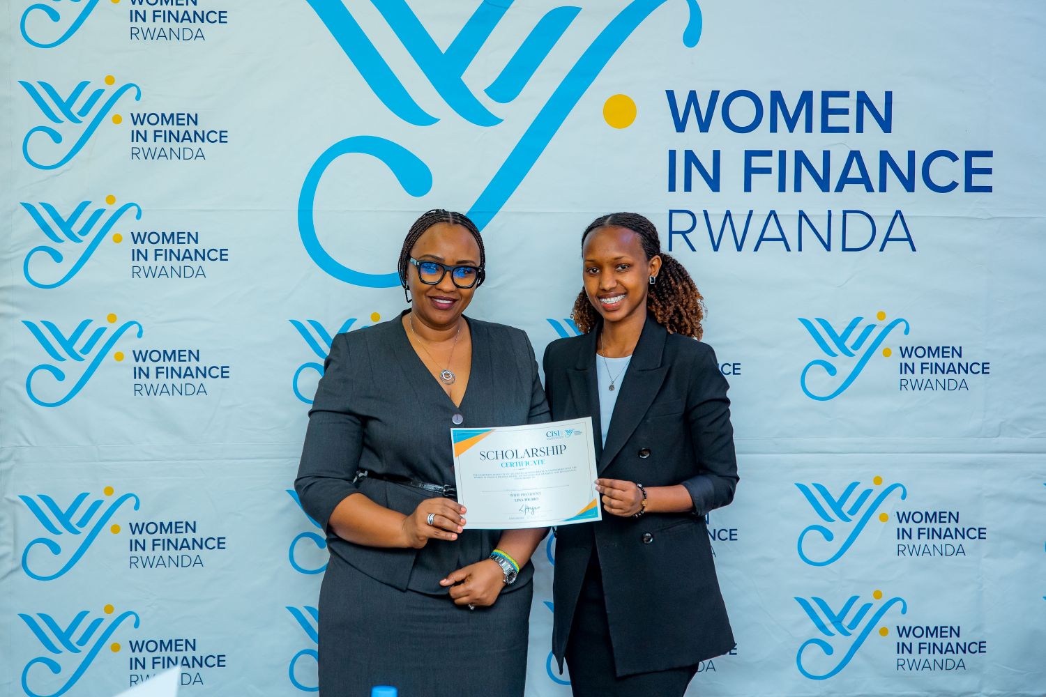 Chantal Ikirenga presented with her scholarship certificate.